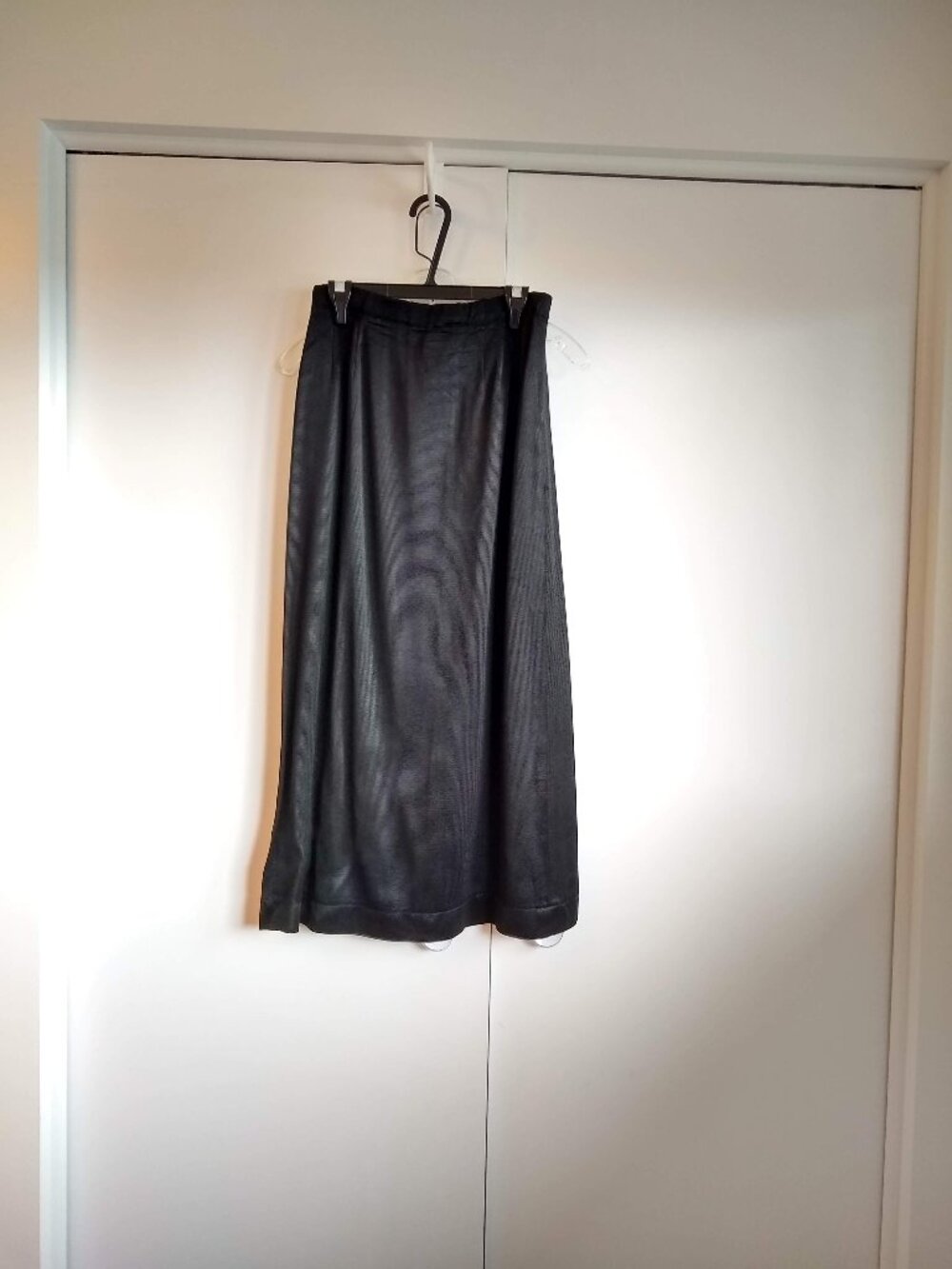vintage 80s simple versatile long black A-line maxi skirt in satiny finish